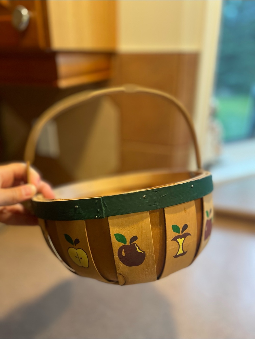 Rustic Hand-Painted Yellow Fruit Basket with Green Trim and Apples
